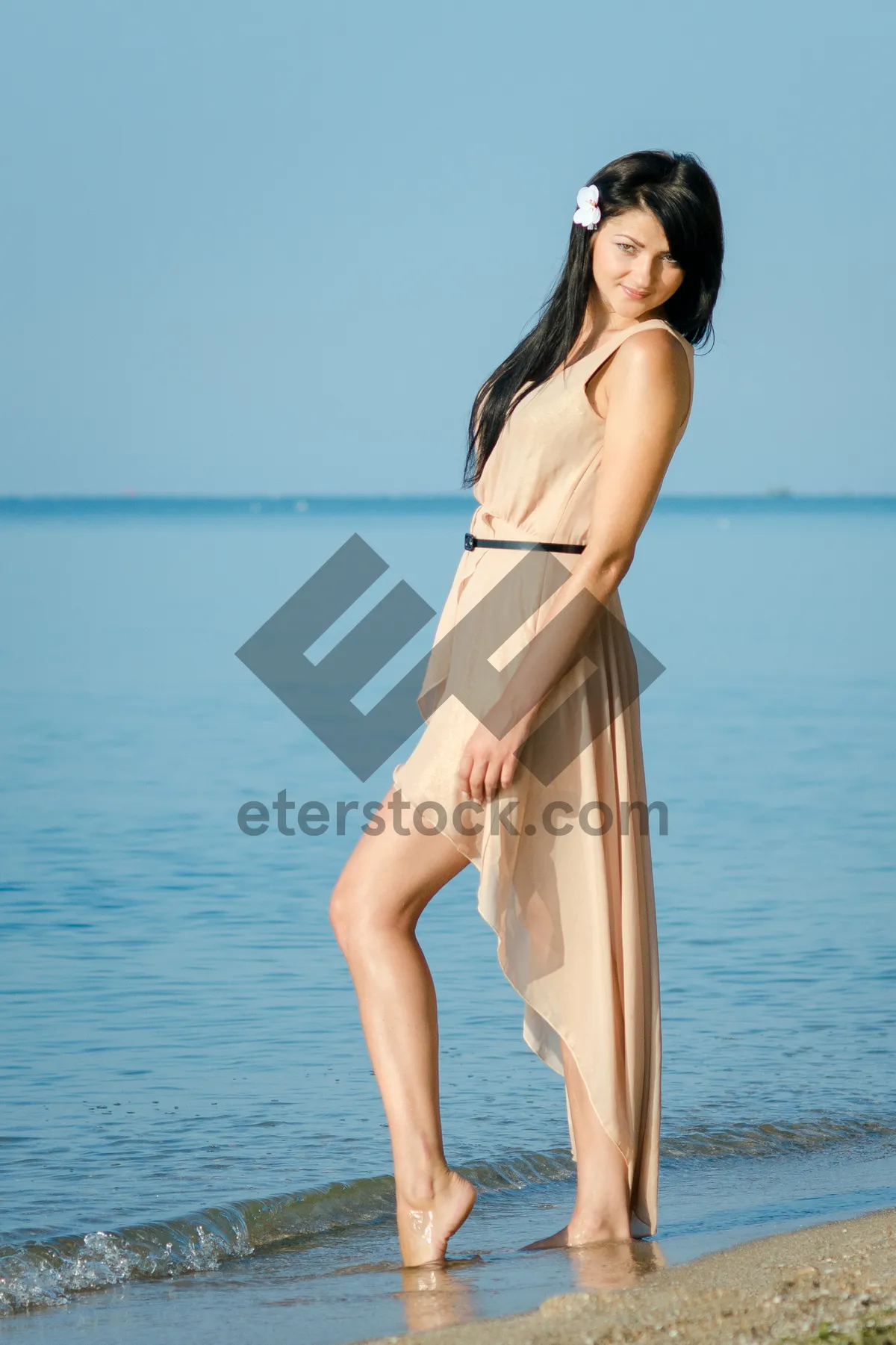 Picture of Beautiful beach day with attractive model in swimsuit