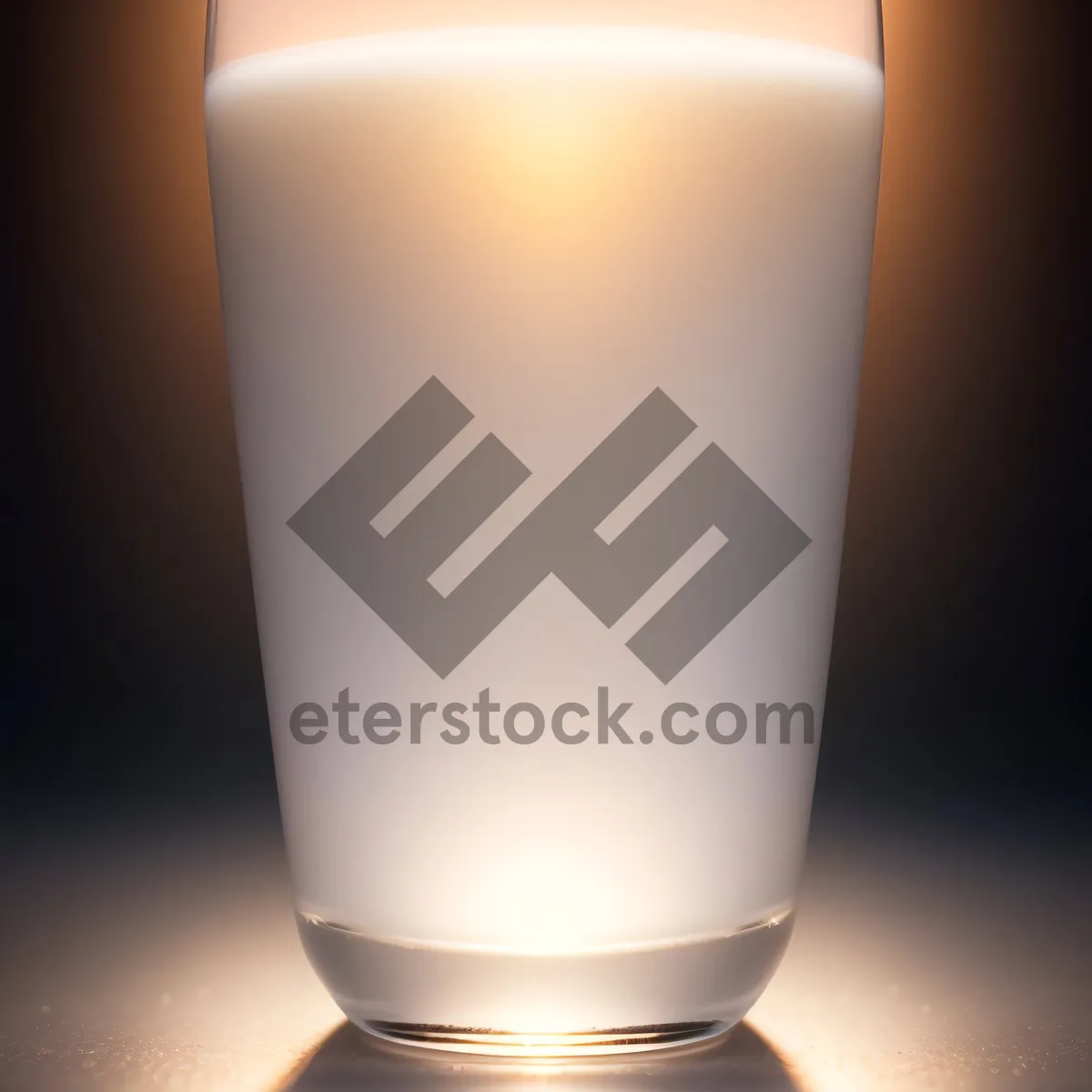 Picture of Foamy Milk in Glass Cup with Candle