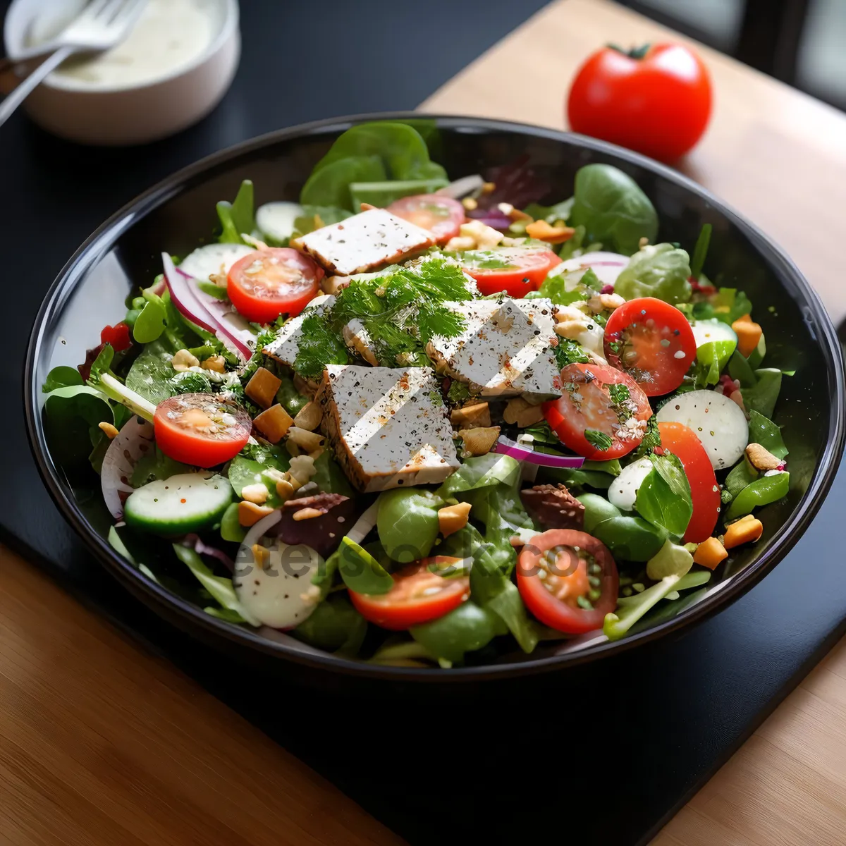 Picture of Fresh vegetarian salad with spicy sauce dressing