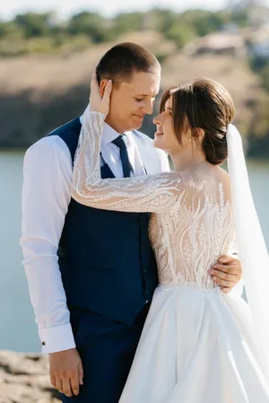 Happy couple in wedding attire, smiling together