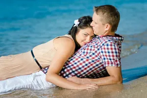 Happy Couple on Beach Vacation in Summer Time