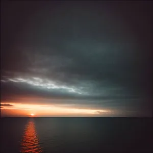 Sunset Reflection on Ocean Horizon