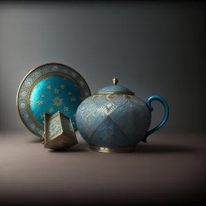 Golden Holiday Teapot: Shimmering Sphere of Winter Celebration