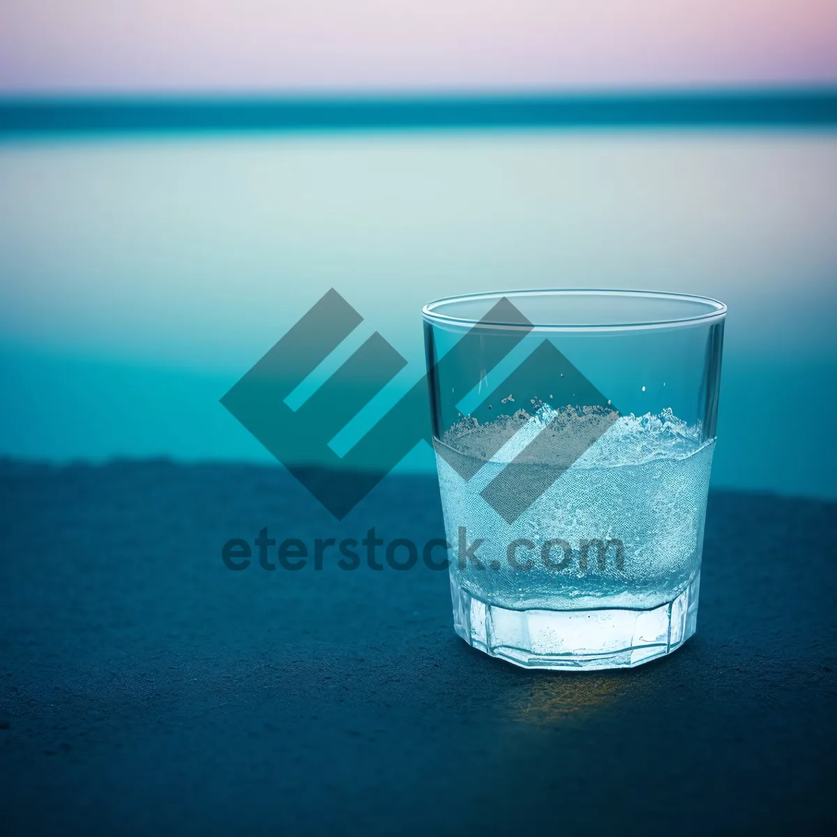 Picture of Refreshing Cocktail in Clear Glass with Ice and Bubbles