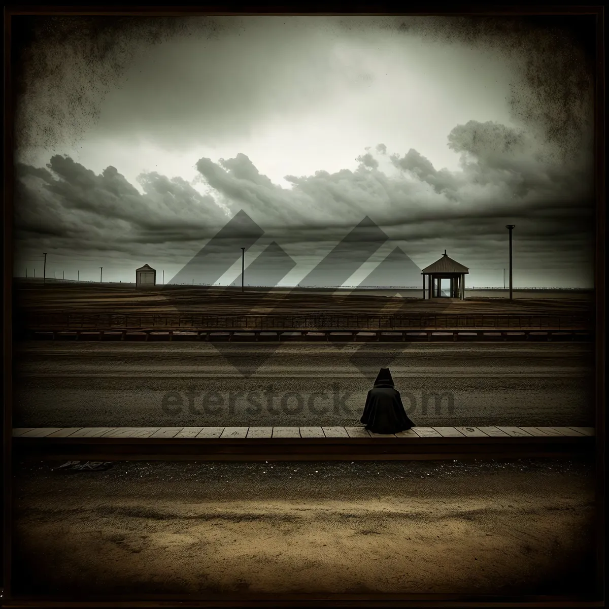 Picture of Serene Sunset Silhouette at Beachside Park Bench