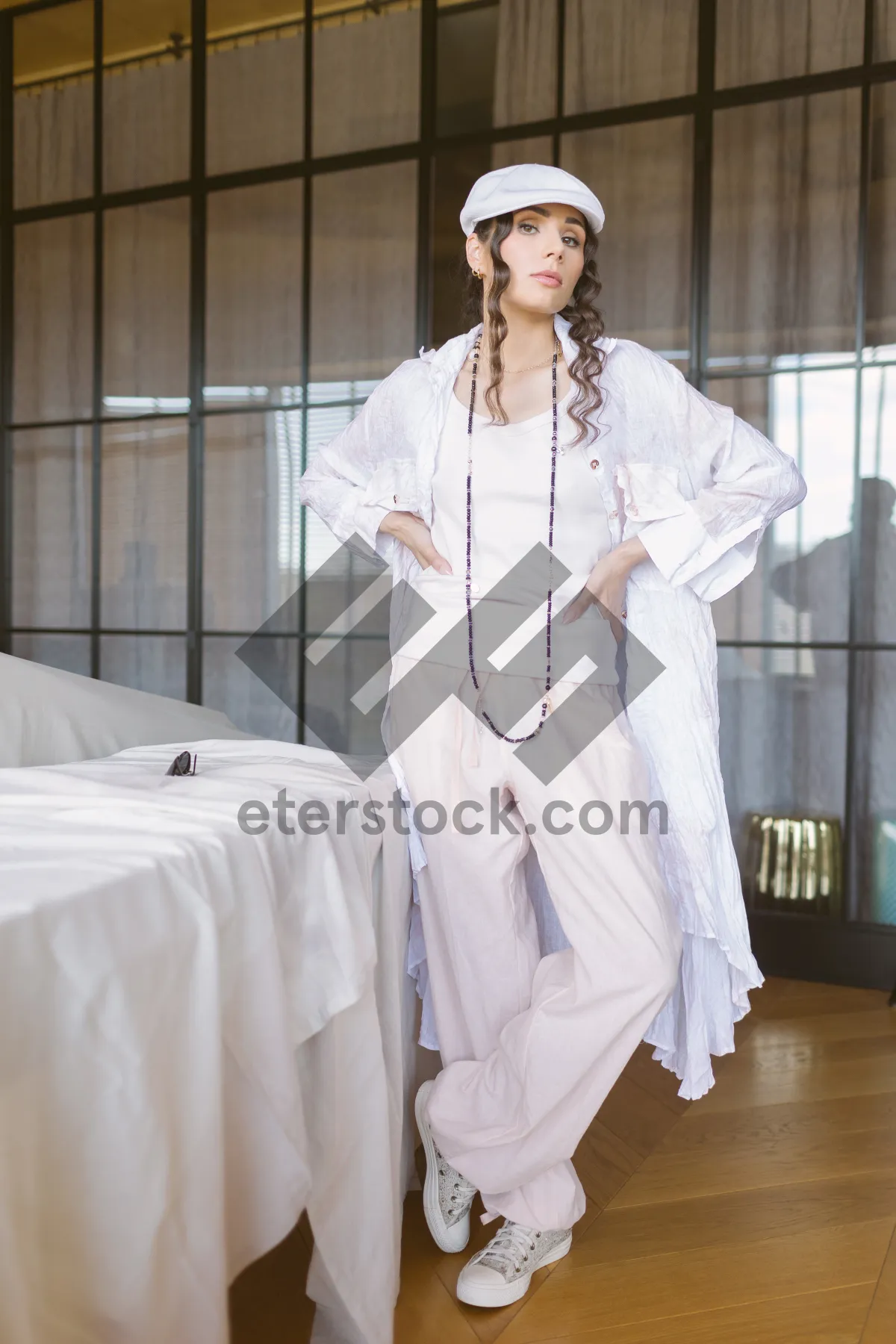 Picture of Happy male doctor in white lab coat smiling.