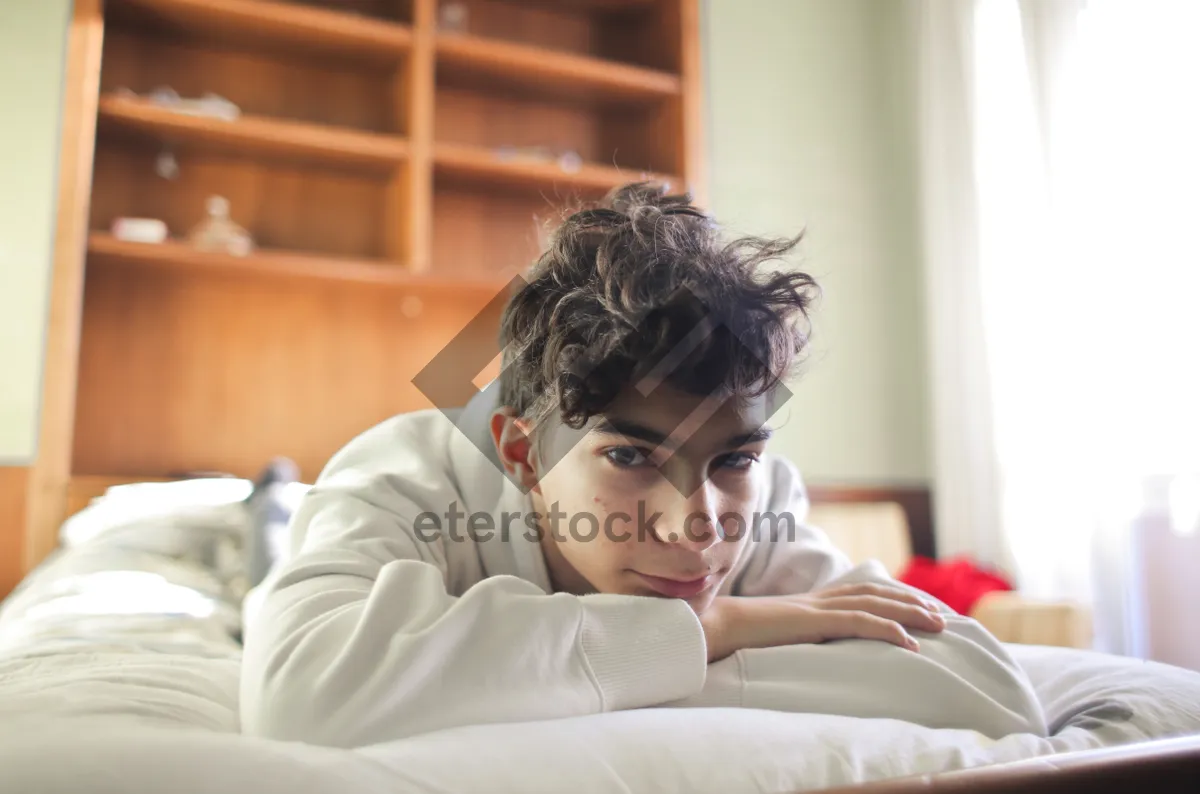 Picture of Happy man with laptop on sofa at home