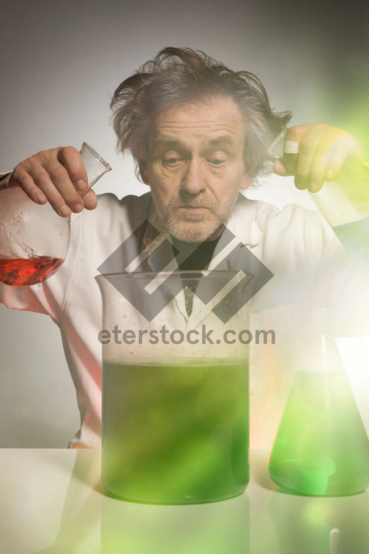 Picture of Happy senior man sitting with laptop at home.