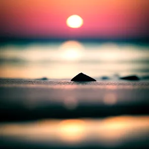Sunset Reflection on Tranquil Beach