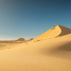 Sizzling Sahara: Majestic Desert Dunes Embrace Endless Adventure