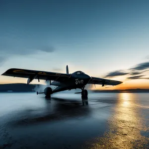 Jet propeller against vibrant sunset sky over beach