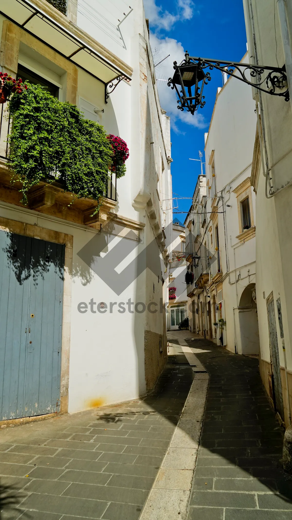 Picture of Old City House with Balcony and Stone Walls