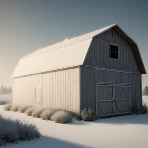 Rustic Winter Barn amidst Snow-Covered Countryside