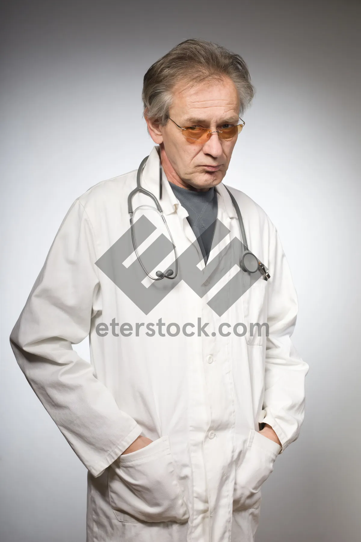 Picture of Happy doctor in white coat with stethoscope portrait.