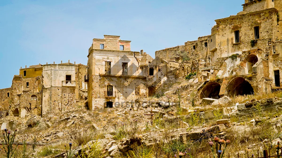 Picture of Ancient castle fortress overlooking historic city skyline