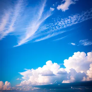 Radiant Summer Sky with Fluffy Clouds