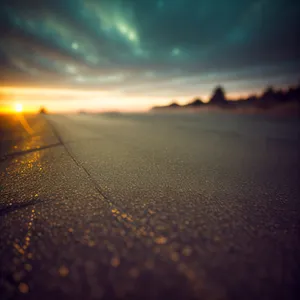 Golden Horizon: Majestic Sunset over the Beach