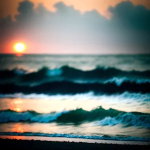 Vibrant Sunset Over Ocean Waves