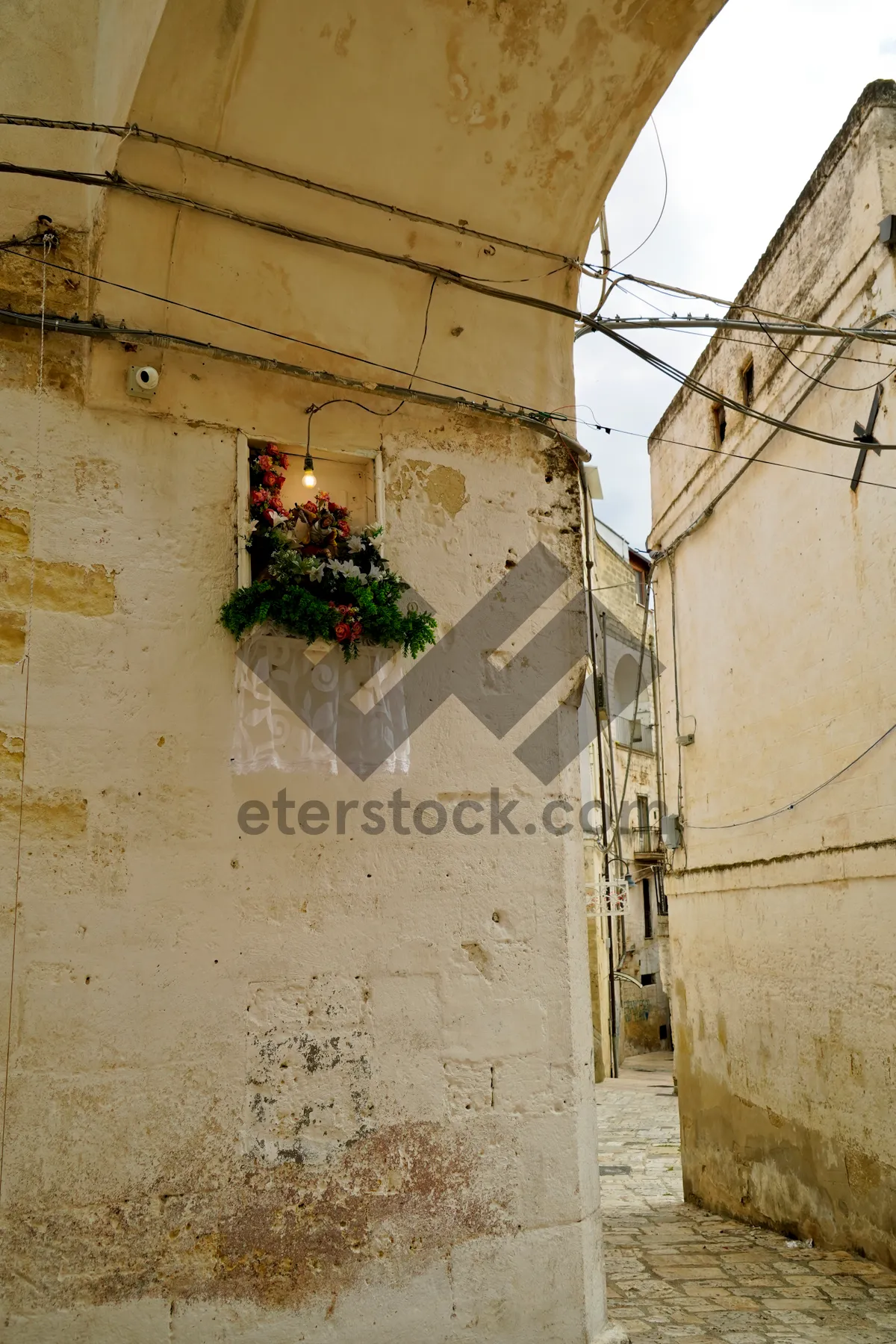 Picture of Old prison building with weathered stucco wall texture