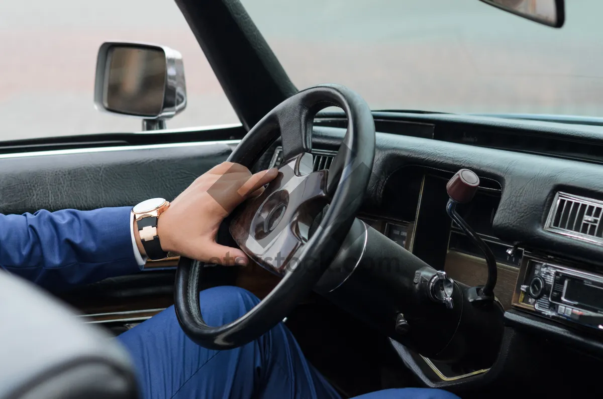 Picture of Modern car interior dashboard, steering wheel and gearshift