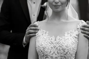 Sexy brunette bride in elegant wedding dress