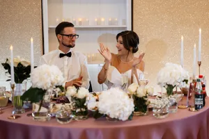 Happy couple celebrating their wedding day outdoors