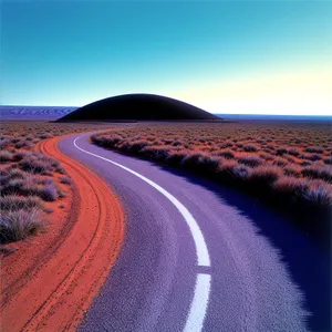 Sandy Road through Desert Landscape
