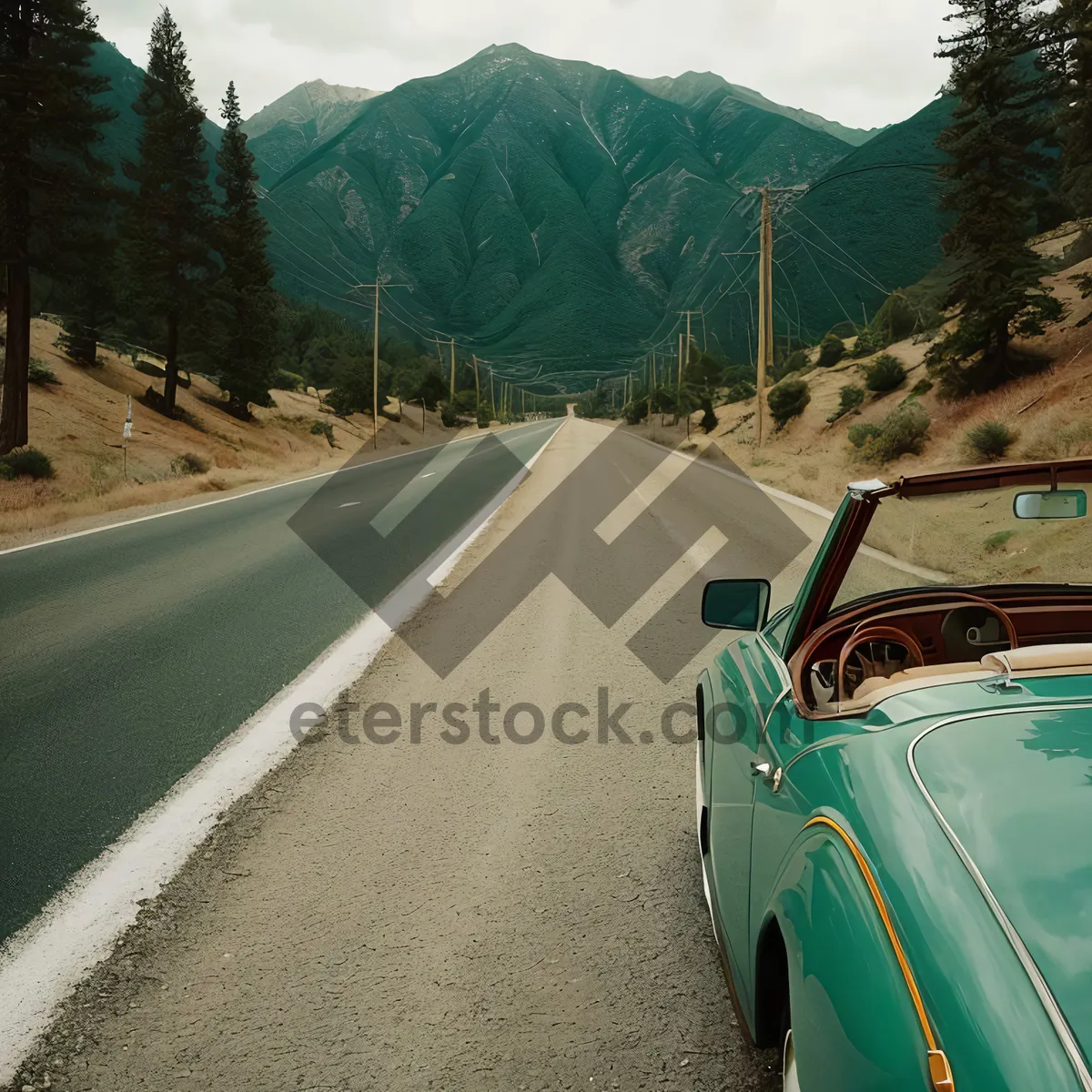 Picture of Speeding car on winding mountain road.