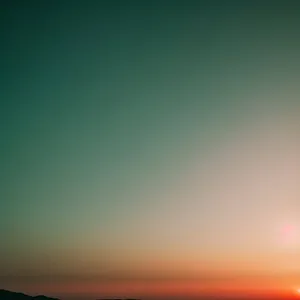 Vibrant Summer Sky with Setting Sun