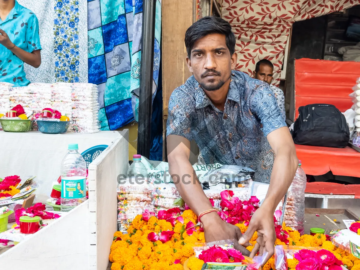 Picture of Happy food seller smiling at child