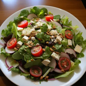 Fresh garden salad with tomato and lettuce