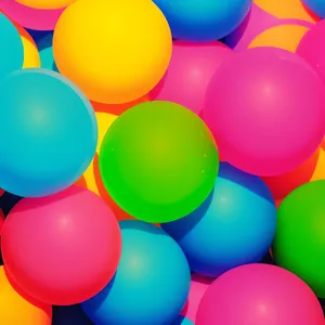 Vibrant Balloon Celebration in Purple, Orange, and Yellow