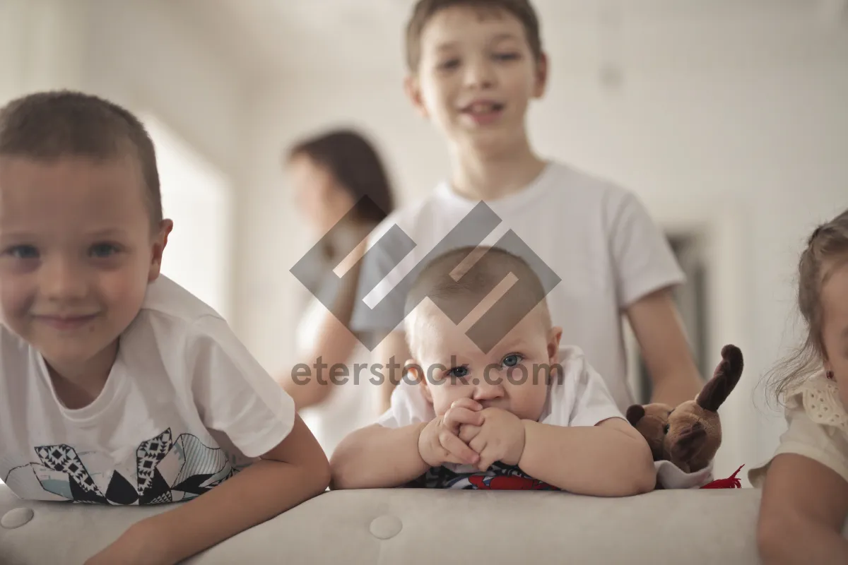 Picture of Happy Family Smiling Together in Bedroom