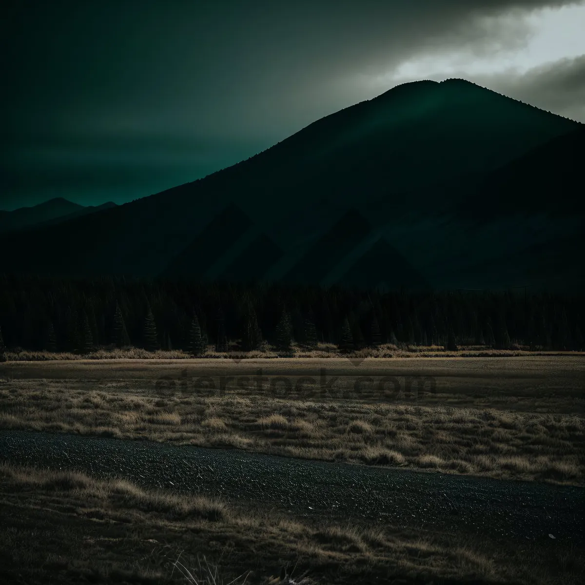 Picture of Majestic Volcanic Mountain Peaks Amidst Forested Range