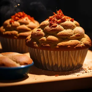 Sweet Chocolate Cupcake with Icing and Sprinkles.