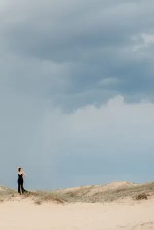 Desert Dune Adventure with Ostrich Bird in Sky