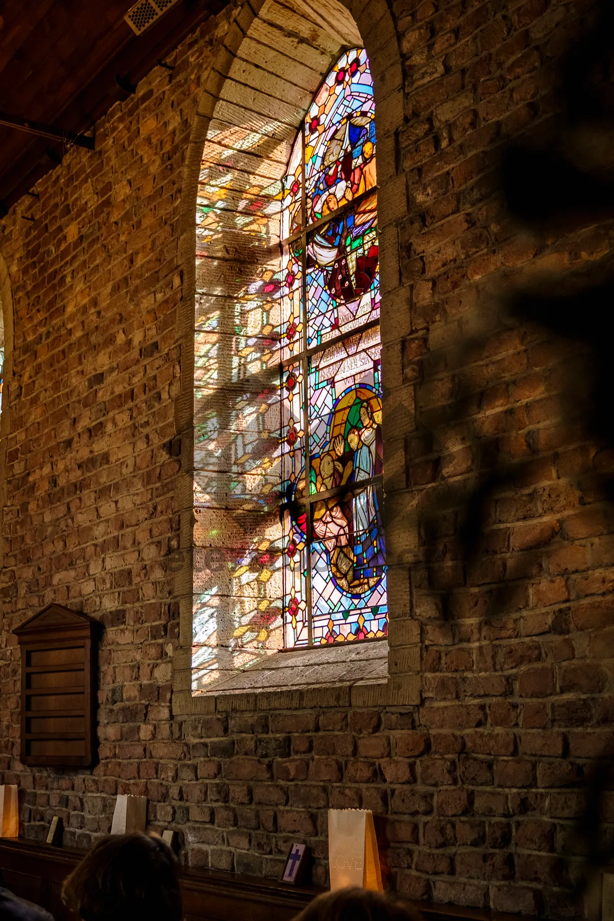 Picture of Historic cathedral window with intricate stone mosaic artwork.