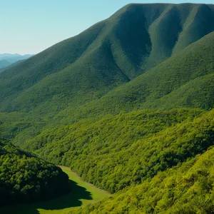 Majestic Highland Range Amidst Serene Countryside