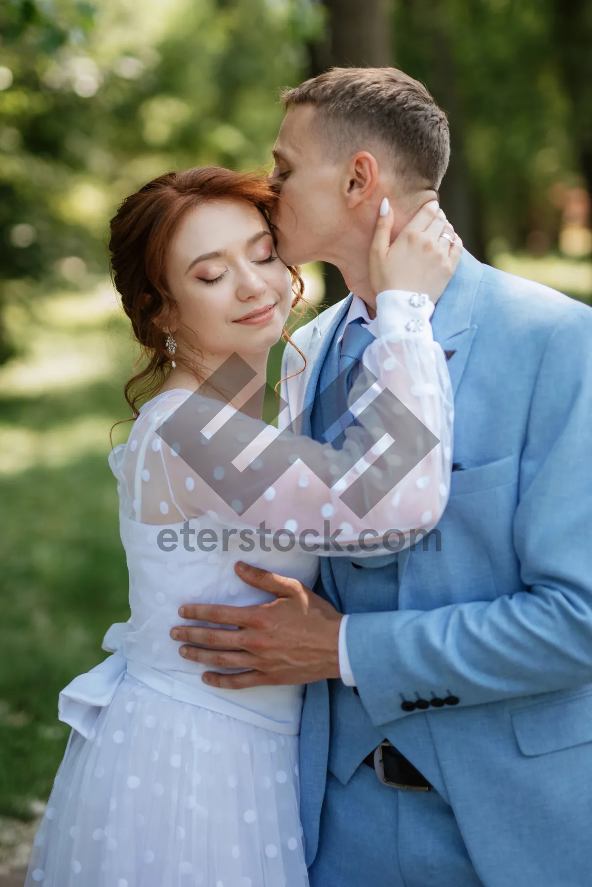 Picture of Happy family portrait outdoors in the park