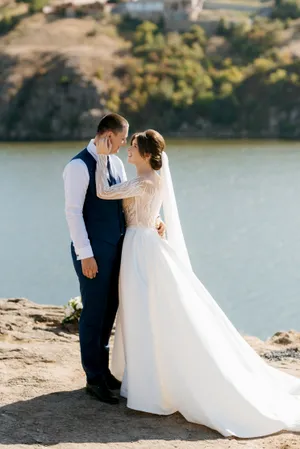 Happy newlywed couple at beach wedding