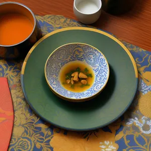 Morning espresso in ceramic mug on table