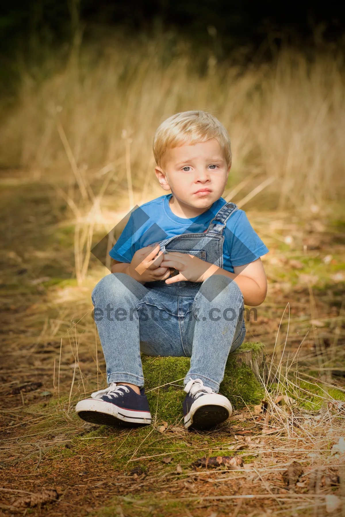 Picture of Happy boy playing soccer ball in the park