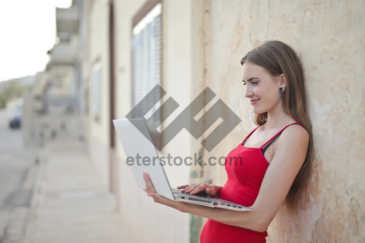 Picture of Smiling brunette model in fashionable maillot at home