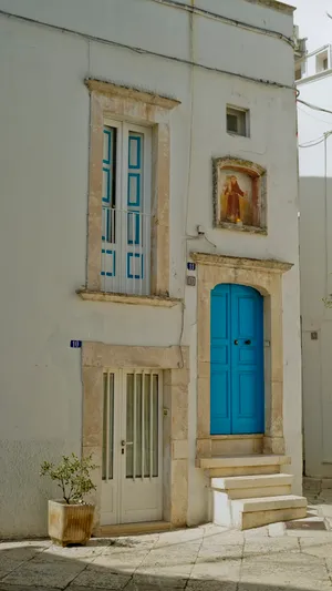 Ancient Stone Church with Balcony and Doorway