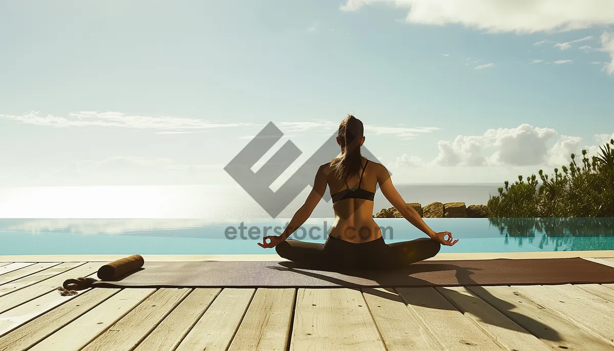 Picture of Sexy woman sitting on tropical beach