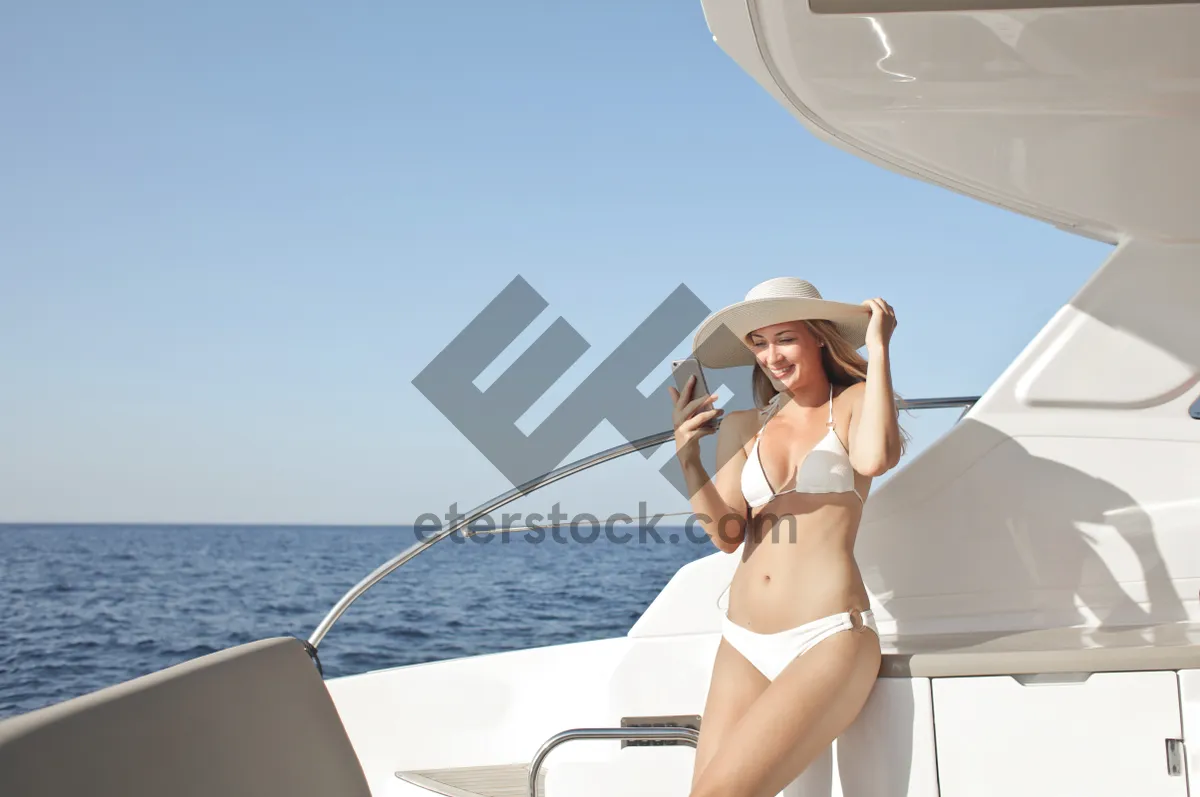 Picture of Happy Surfer Enjoying Beach Vacation Under the Sun