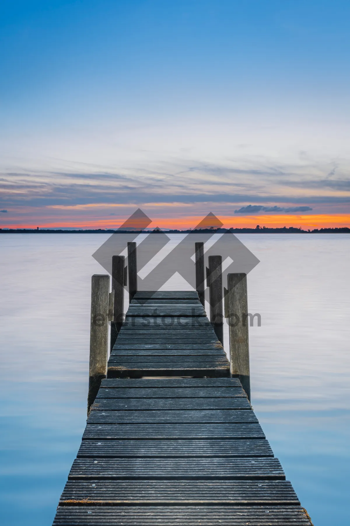 Picture of Tropical beach pier with wooden bridge and boat.