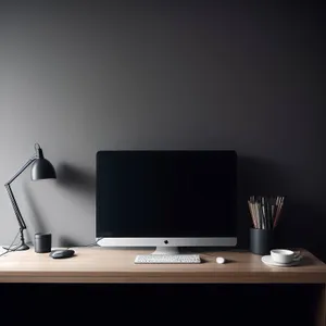 Modern Office Setup with Desktop Computer and Keyboard