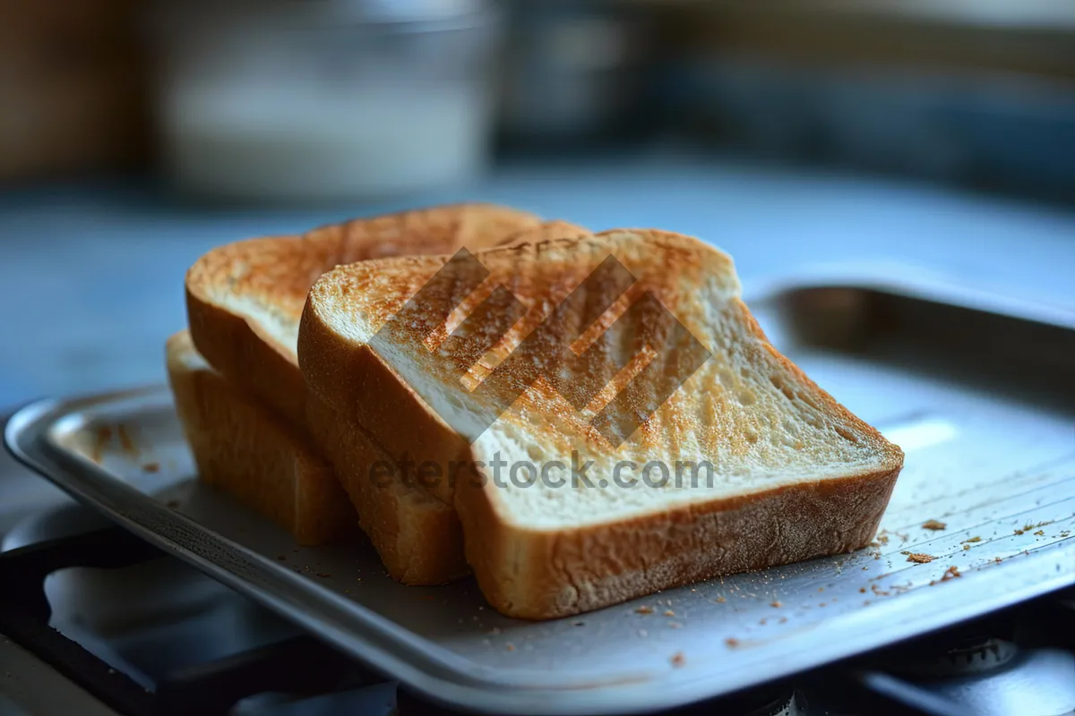 Picture of Delicious freshly baked whole wheat toast with butter