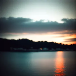Silhouette of a Sunset over a Lake